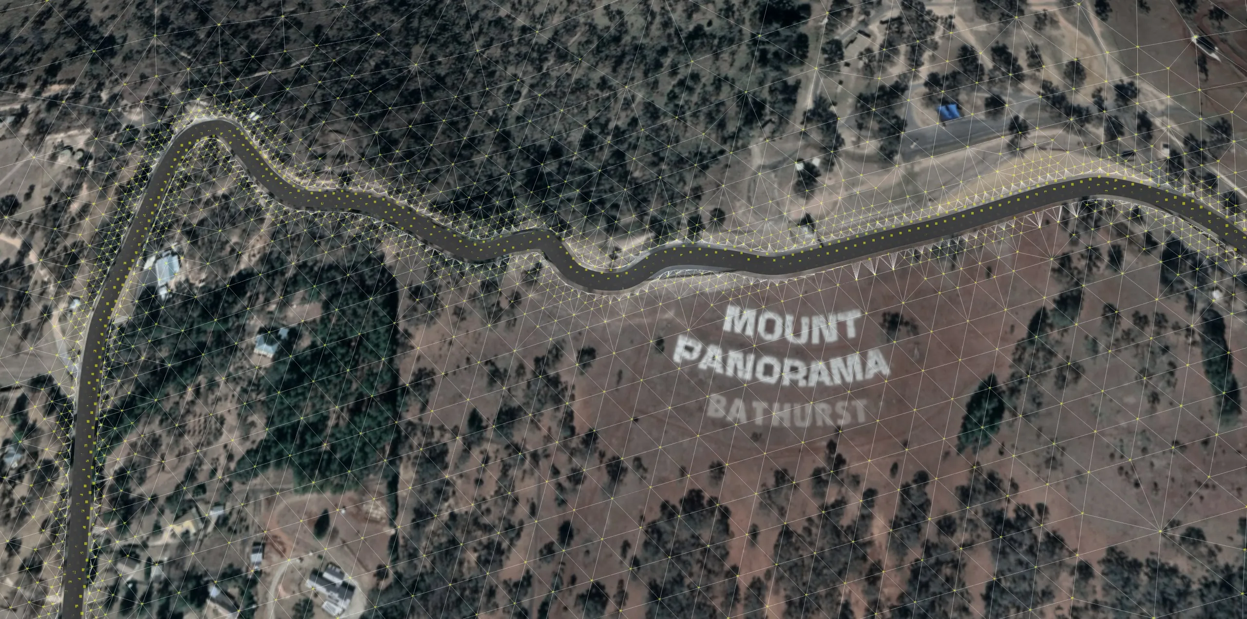 Wireframe over Mount Panorama, Bathurst, with dense terrain triangles along the track and larger ones further away